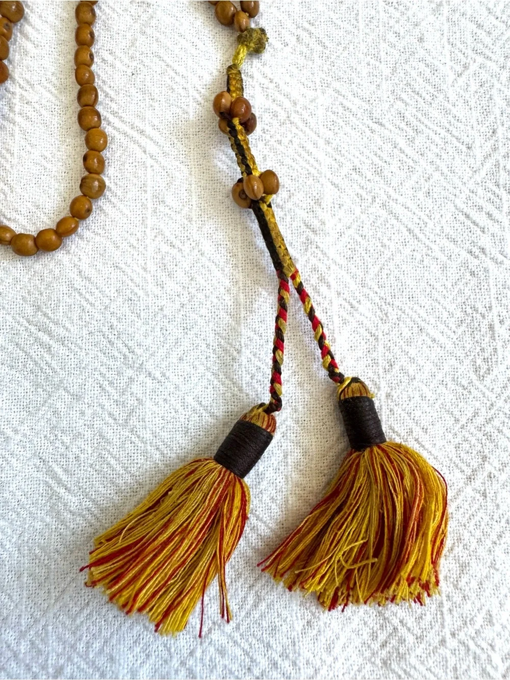 Meditation Beads: Knotted Chord with Small Beaded Sections and Tassels.